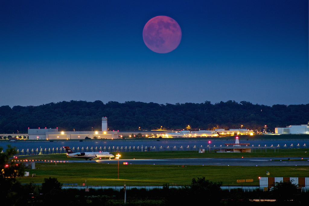 The "Super Moon" rises over Reagan National Airport by Joseph Gruber