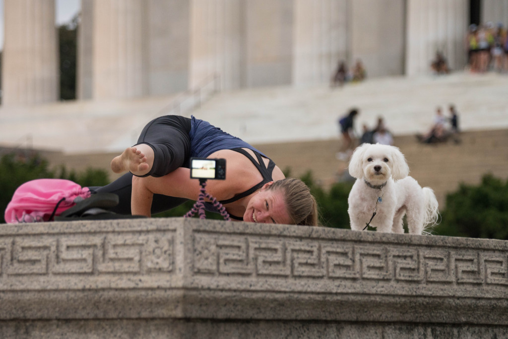 yoga selfie with pet by Kevin Wolf